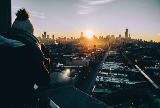 man in black jacket standing on top of building during 3648063 111940317648